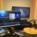 Podcast Room showing TV and small control table